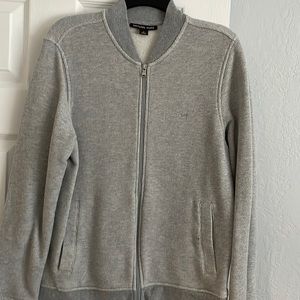 Light gray men zip up sweater only used ones size medium